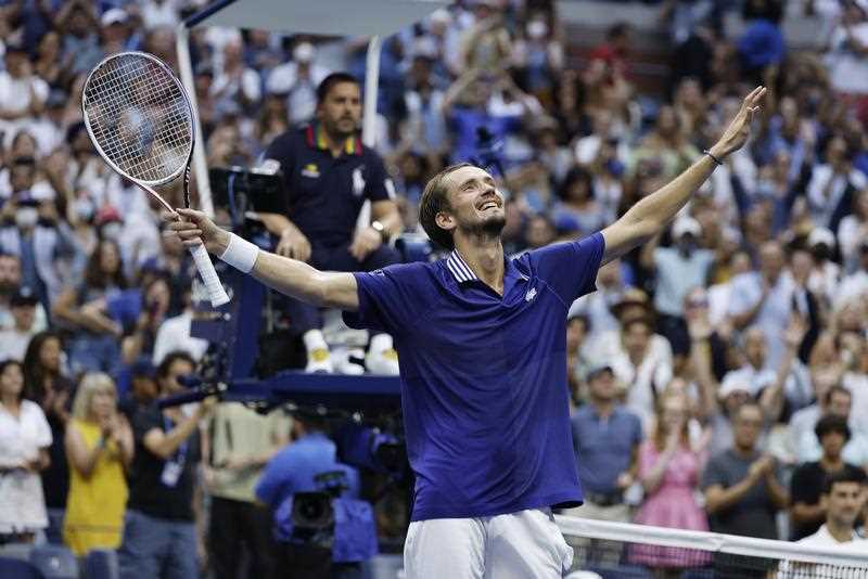Daniil Medvedev of Russia reacts after defeating Novak Djokovic of Serbia during their men's final match on the fourteenth day of the US Open Tennis Championships at the USTA National Tennis Center in Flushing Meadows, New York