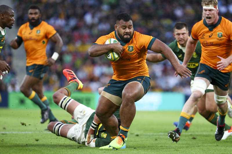 Australia's Taniela Tupou runs at the defense during the Rugby Championship test match between the Springboks and the Wallabies in Brisbane, Australia, Saturday, Sept. 18, 2021.