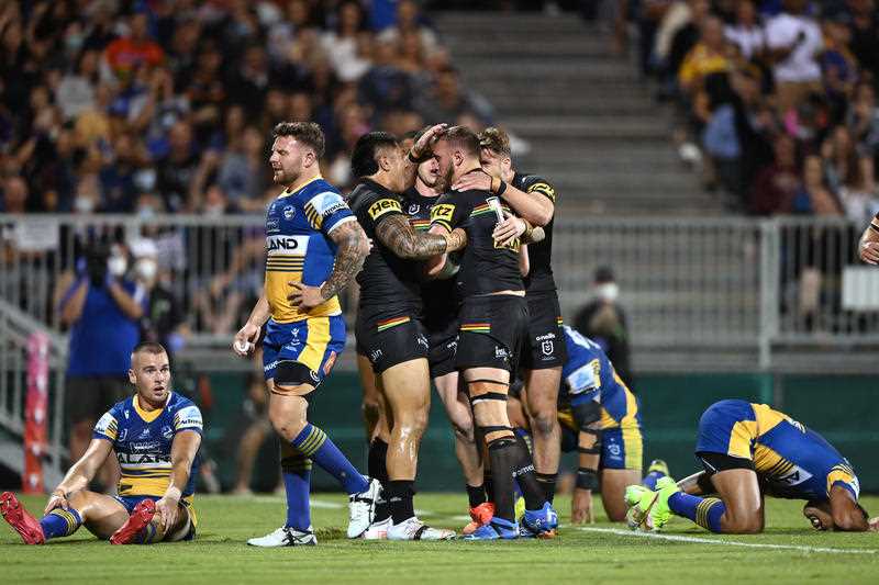 Panthers players celebrate after Kurt Capewell scored a try during the NRL Semi Final match between the Penrith Panthers and the Parramatta Eels at BB Print Stadium in Mackay, Saturday, September 18, 2021.