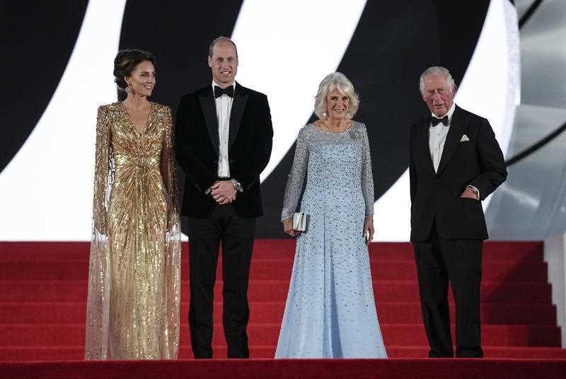 Britain's Prince Charles, from right, his wife Camilla the Duchess of Cornwall, Britain's Prince William and his wife Kate the Duchess of Cambridge pose for photographers upon arrival for the World premiere of the new film from the James Bond franchise 'No Time To Die', in London Tuesday, Sept. 28, 2021
