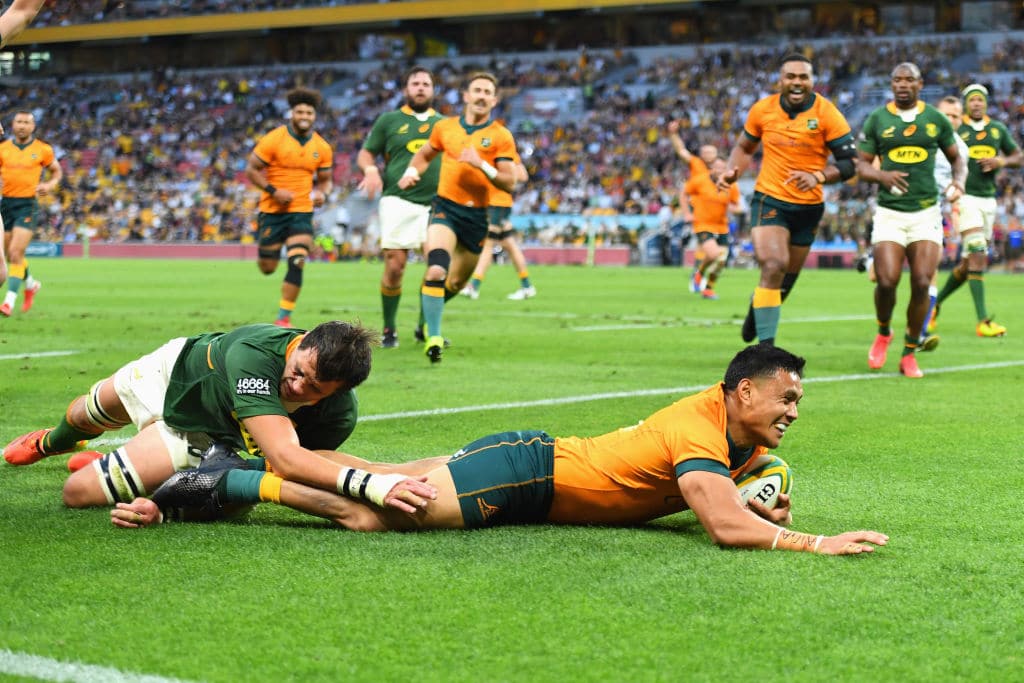 BRISBANE, AUSTRALIA - SEPTEMBER 18: Len Ikitau of the Wallabies scores a try during The Rugby Championship match between the Australian Wallabies and the South Africa Springboks at Suncorp Stadium on September 18, 2021 in Brisbane, Australia. (Photo by Albert Perez/Getty Images)