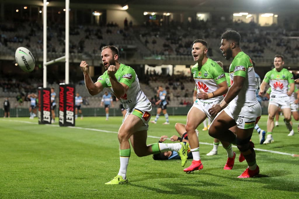 SYDNEY, AUSTRALIA - SEPTEMBER 26: Matt Frawley of the Raiders celebrates with team mates after scoring a try during the round 20 NRL match between the Cronulla Sharks and the Canberra Raiders at Netstrata Jubilee Stadium on September 26, 2020 in Sydney, Australia. (Photo by Mark Kolbe/Getty Images)