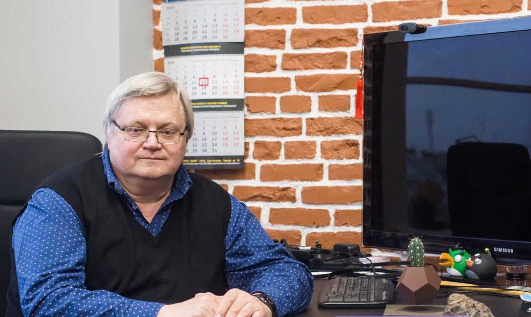 Australian National University physicist Professor Yuri Kivshar is seen at his desk