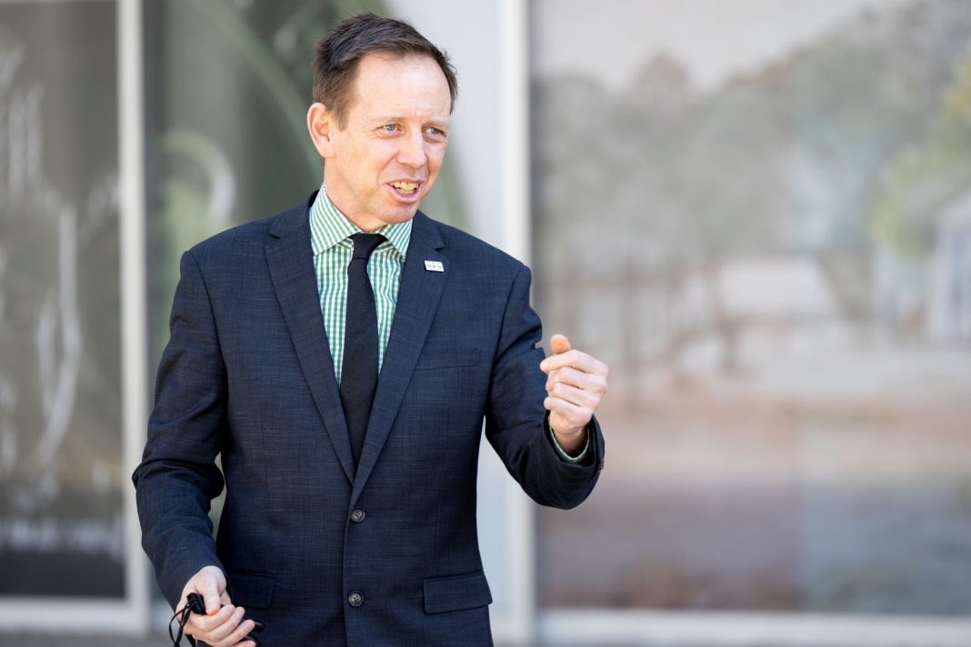 ACT Attorney-General Shane Rattenbury is seen at a press conference outside the ACT Legislative Assembly in Canberra