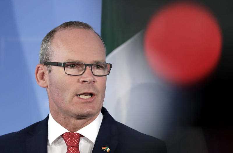 The Deputy Prime Minister of Ireland, Simon Coveney, addresses the media at a press conference