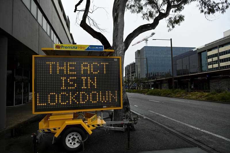 A sign reads ‘The ACT is in lockdown’ in Canberra, Tuesday, August 24, 2021