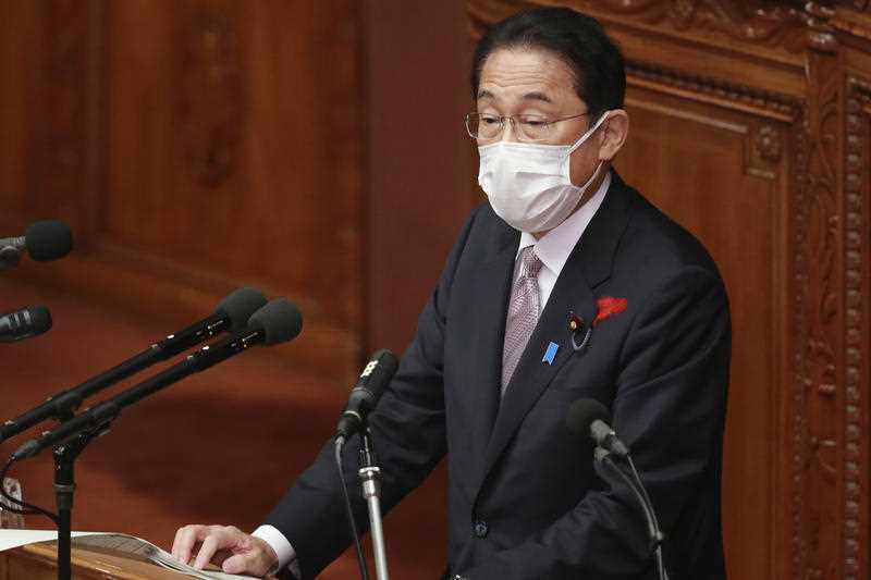 Fumio Kishida delivers a speech during an extraordinary Diet session at the lower house of parliament in Tokyo, Monday, Oct. 11, 2021.