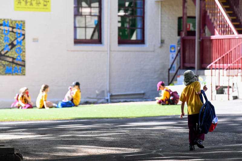 School students return back to school after COVID-19 restrictions were lifted, at Glebe Public School in Sydney, Monday, October 18, 2021.