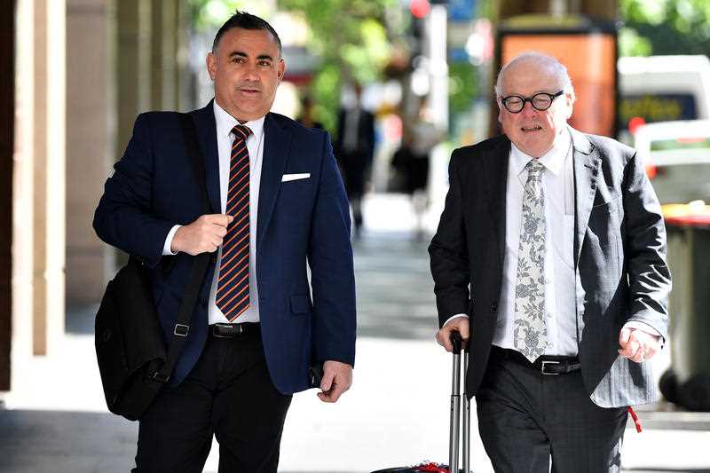 Former NSW deputy premier John Barilaro (left) arrives at the Independent Commission Against Corruption (ICAC) hearing in Sydney, Monday, October 25, 2021.