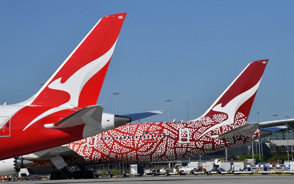 Qantas charged COVID