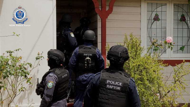 NSW police are seen conducting a search warrant on a property in Northmead, Sydney, Wednesday, November 3, 2021.