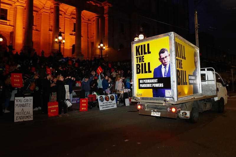 Protestors are seen during a demonstration outside the Victorian State Parliament in Melbourne, Monday, November 15, 2021
