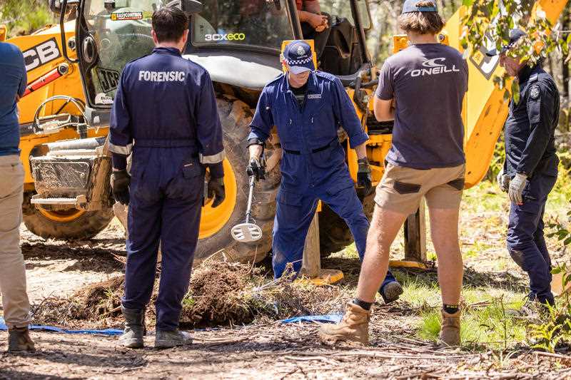 Victoria Police and forensics search for remains of missing campers Russell Hill and Carol Clay in bushland north of Dargo, Vic, Tuesday, November 30, 2021