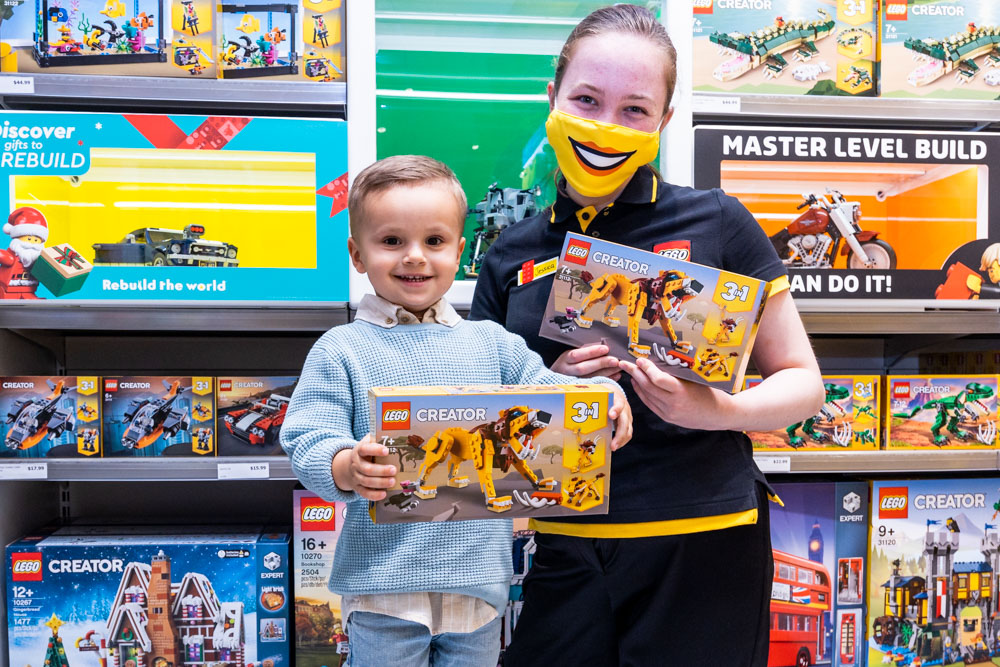 Big LEGO fan Dawson with LEGO team member Jessica in the new store_Kerrie Brewer