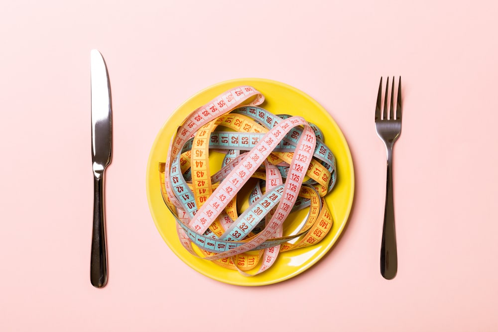 cutlery on pink background