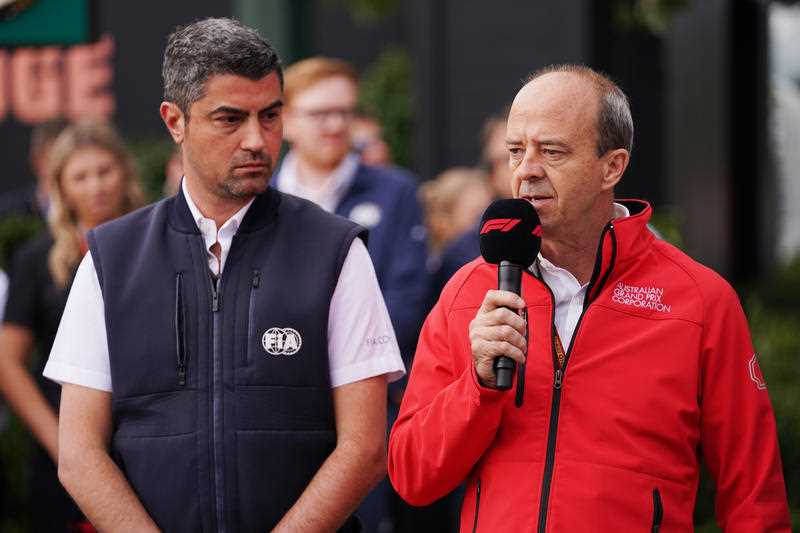 Australian Grand Prix Corporation CEO, Andrew Westacott, speaks to media next to Michael Masi (left)