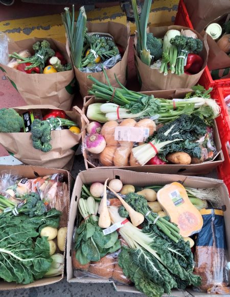 boxes of fresh supermarket produce rescued by food donation charity