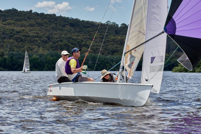 Smoke, skippered by Michael Forster, and crewed by Andy Forster and Simon Doherty, won first place in Canberra’s first Sharpie Nationals this month, held on Lake Burley Griffin. Photo: Tony Burslem.