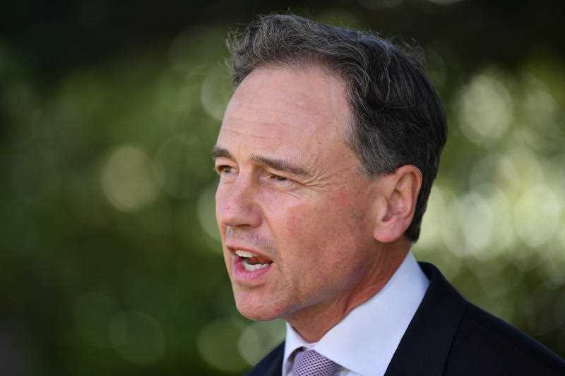 Federal Minister for Health and Aged Care Greg Hunt speak to media