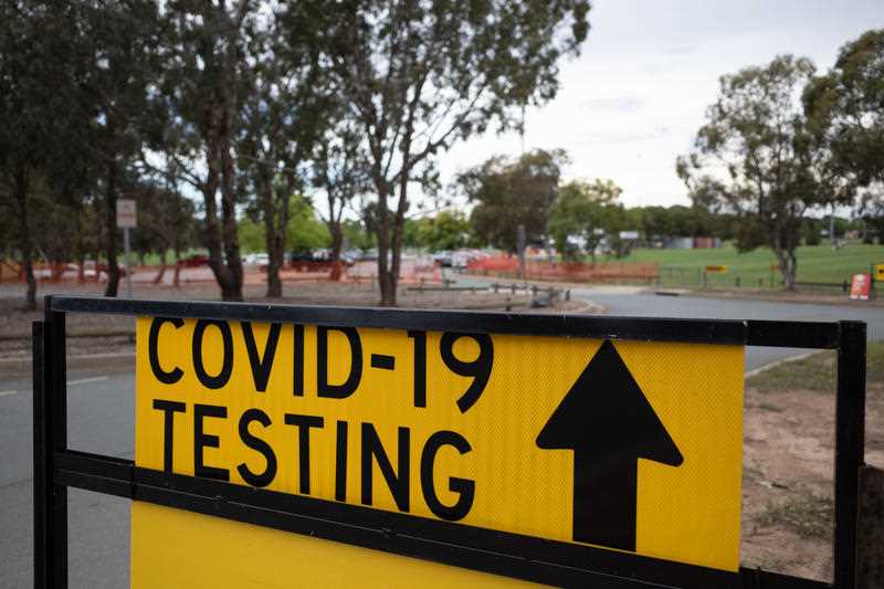 A sign for a COVID-19 testing site is seen in the suburb of Nicholls in Canberra, Wednesday, December 15, 2021.