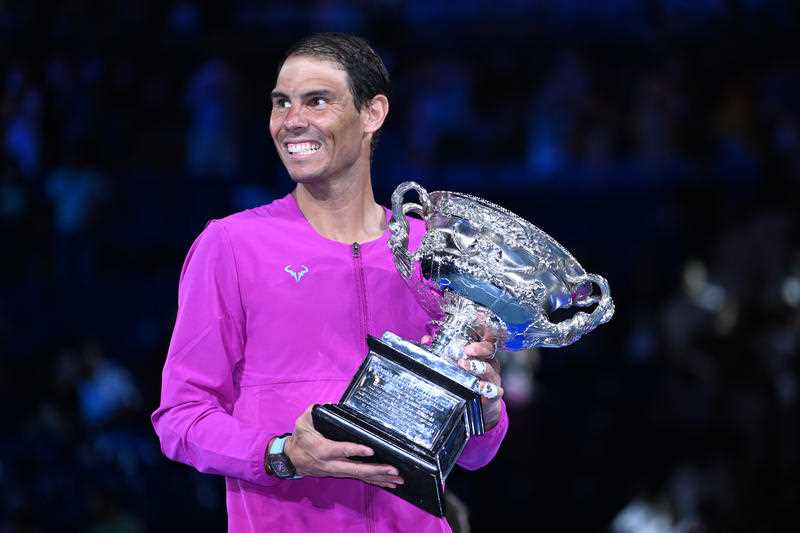Rafael Nadal of Spain holds the Norman Brookes Challenge Cup after winning the men’s singles final against Daniil Medveded of Russia on Day 14 of the Australian Open at Melbourne Park in Melbourne, Saturday, January 29, 2022.
