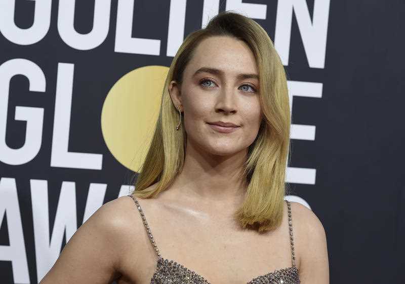 Saoirse Ronan arrives at the 77th annual Golden Globe Awards at the Beverly Hilton Hotel on Sunday, Jan. 5, 202