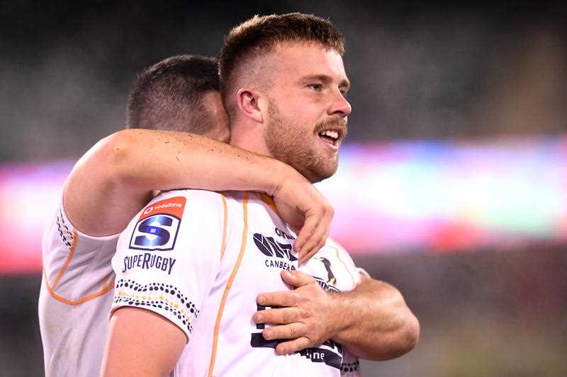 Mack Hansen of the Brumbies celebrates after scoring the winning kick during the Round 5 Super Rugby match between the ACT Brumbies and Queensland Reds at GIO Stadium in Canberra, Saturday, August 1, 2020.