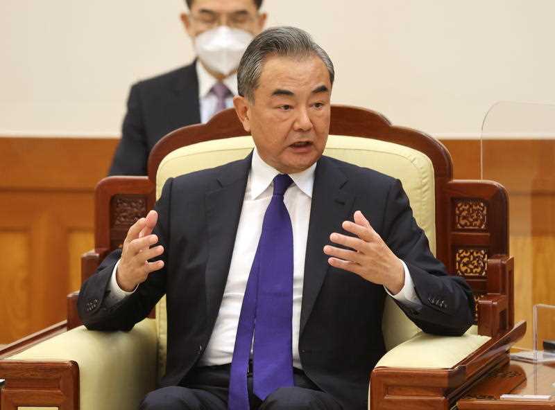 Chinese Foreign Minister Wang Yi speaks during a meeting in Seoul in 2021