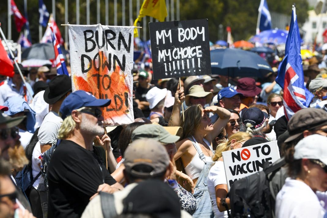 People take part in a ‘Convoy to Canberra’ protest outside Parliament House in Canberra, Saturday, February 12, 2022.