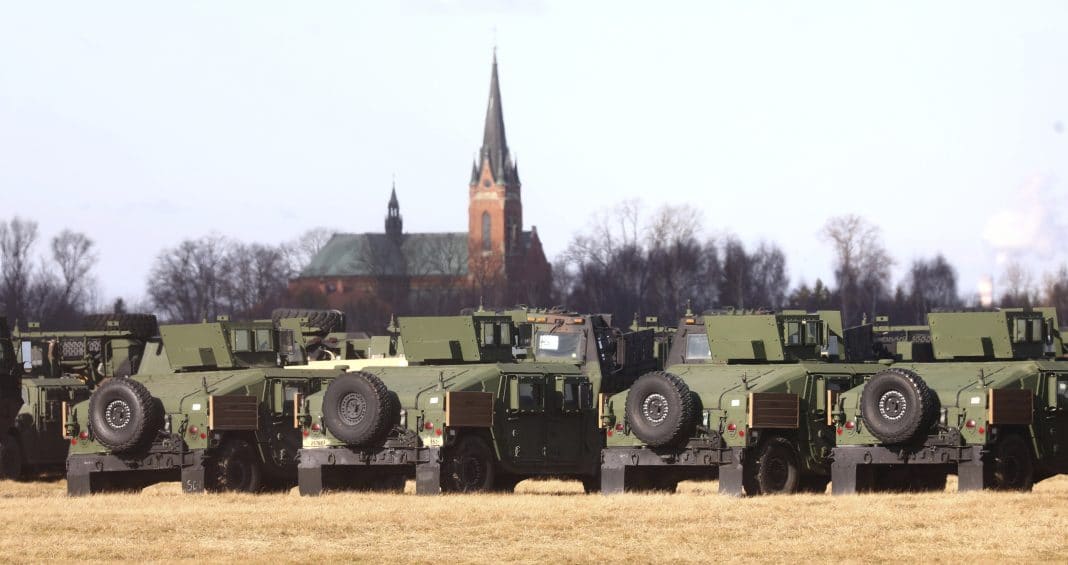 U.S. troops of the 82nd Airborne Division recently deployed to Poland because of the Russia-Ukraine tensions are setting up camp at a military airport in Mielec, southeastern Poland, on Saturday, Feb. 12, 2022.