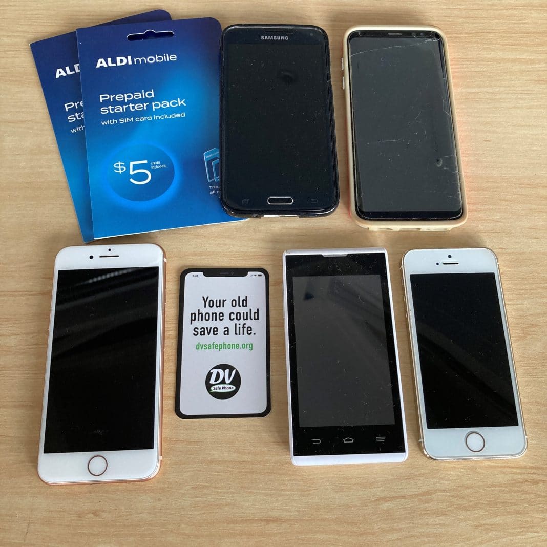 A collection of used mobile phones collected to donate to victims of domestic violence