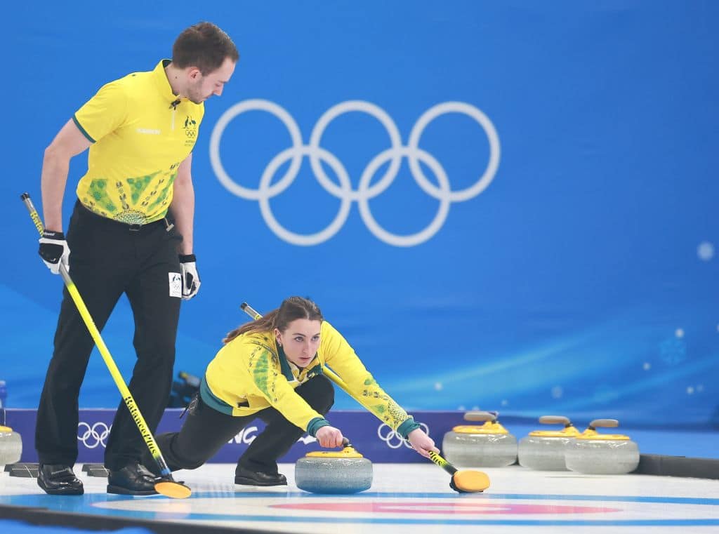 an Australian mixed pair competing in curling at the Beijing Winter Olympics, February 2022