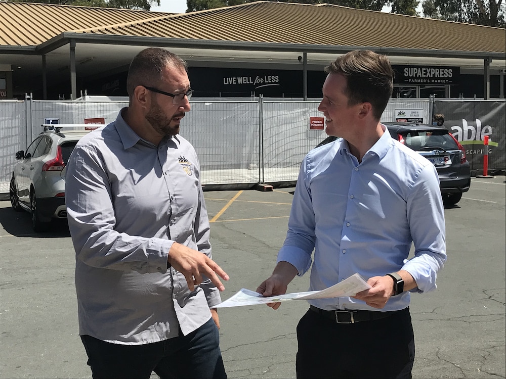 Johnny Noja, from Able Landscaping, and Chris Steel, ACT Minister for Transport and City Services, at Kippax's Gwydir Square. Photo: Nick Fuller