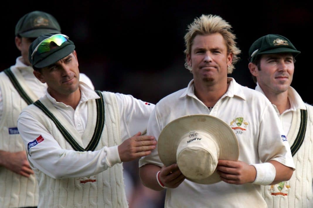 Australia's Shane Warne (R) in consoled by Justin Langer (L) after he bowls his last test over in England during the fifth test at the Brit Oval in London Monday 12 September 2005.