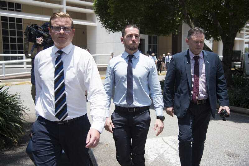 Zachary Rolfe (centre) departs the Supreme Court of the Northern Territory, in Darwin, Wednesday, March 2, 2022.
