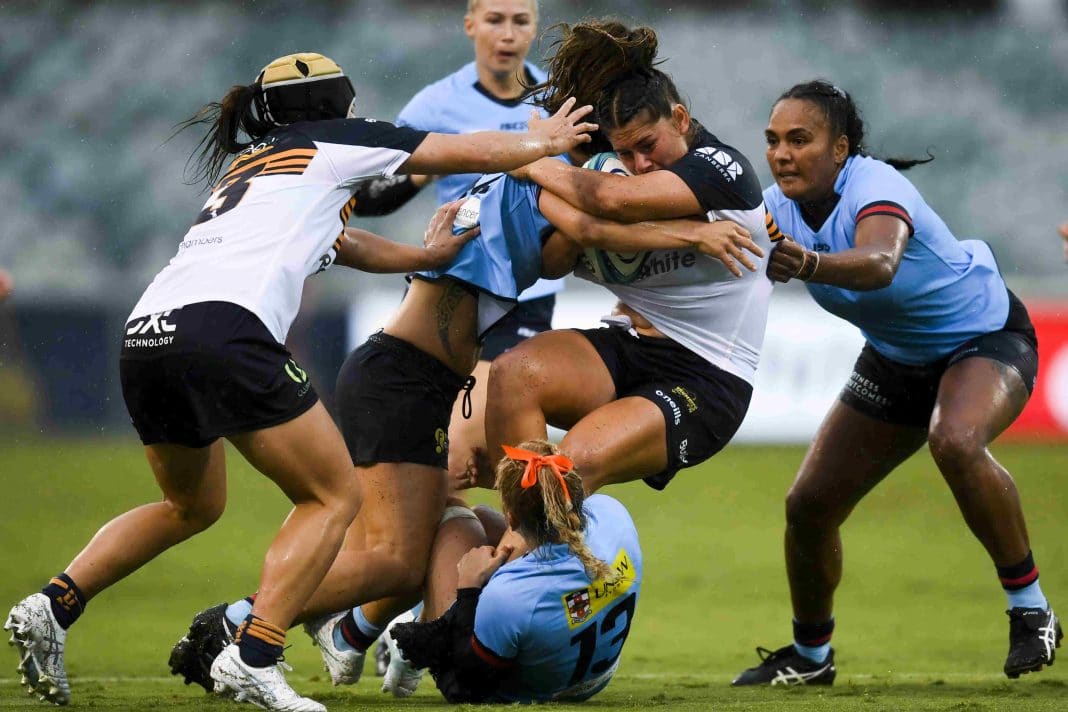 Lilly-Anne Mason-Spice of the Brumbies is tackled during the Round 1 Super Rugby Women’s match between the ACT Brumbies and NSW Waratahs at GIO Stadium in Canberra, Saturday, March 5, 2022