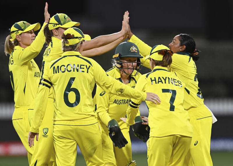 Australian players celebrate the wicket of England's Amy Jones during the ICC Women's Cricket World Cup 2022 cricket match between England and Australia at Seddon Park in Hamilton, New Zealand, Saturday, March. 5, 2022