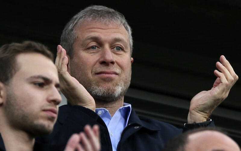Chelsea's Russian owner Roman Abramovich is seen applauding his players after a 6-0 victory in London in 2014
