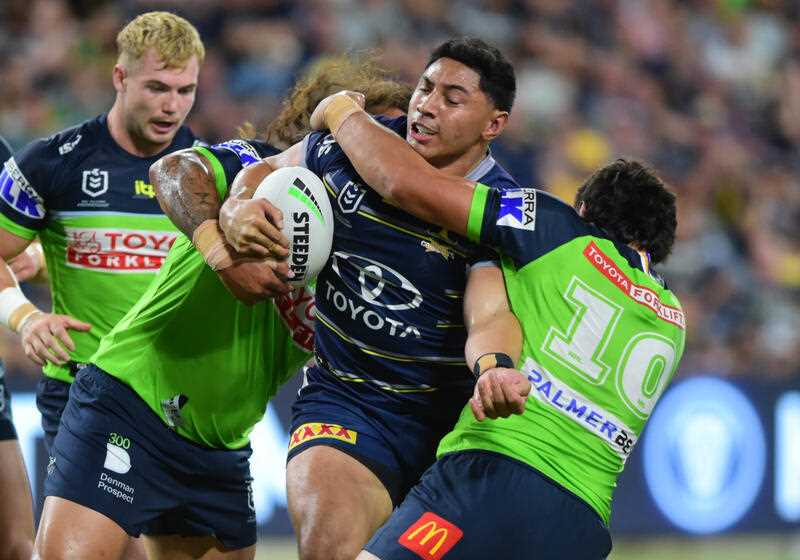 Jason Taumalolo of the Cowboys powers through the Raiders defence in the NRL match in Townsville on Saturday night 19 March 2022