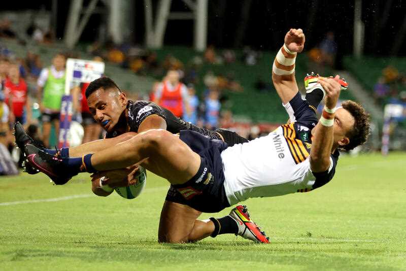 Toni Pulu of the Force collides with Tom Banks of the Brumbies whilst running in for a try during the Round 6 Super Rugby Pacific match between Western Force and ACT Brumbies at HBF Park in Perth, Friday, March 25, 2022.