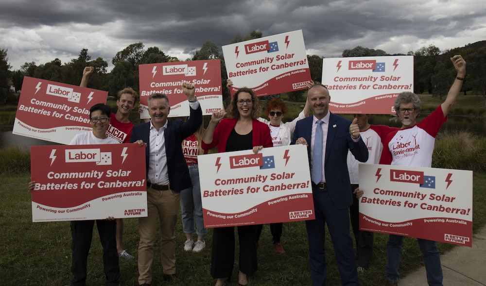 Chris Bowen, Shadow Minister for Climate Change and Energy, Alicia Payne MP, and Chief Minister Andrew Barr, with Labor supporters. Photo provided.