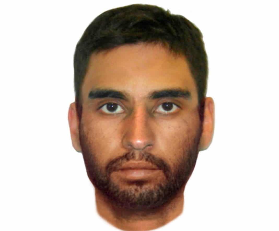 face-fit image of a man of colour aged about 20-30 years old with short dark hair and facial hair, brown eyes