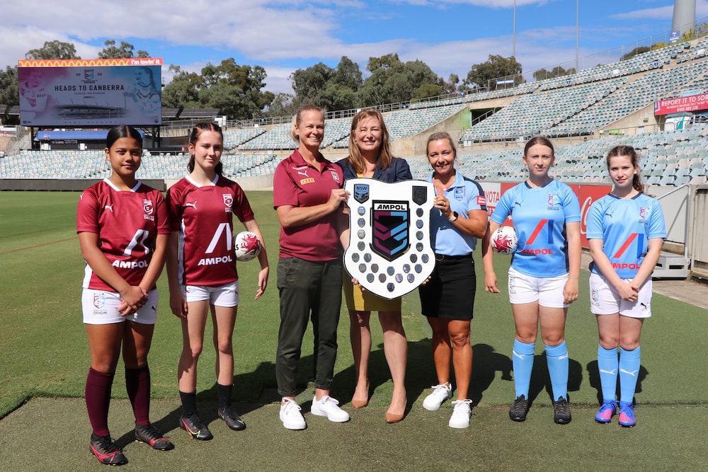 Yvette Berry, ACT Minister for Sport and Recreation, with some of Canberra's young female rugby league stars of tomorrow. Photo provided