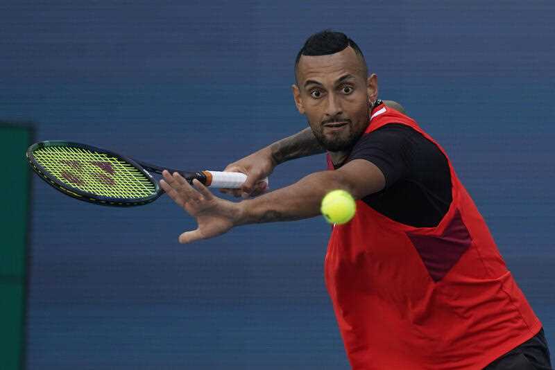 Nick Kyrgios of Australia, eyes a shot by Fabio Fognini of Italy, during the Miami Open tennis tournament, Sunday, March 27, 2022