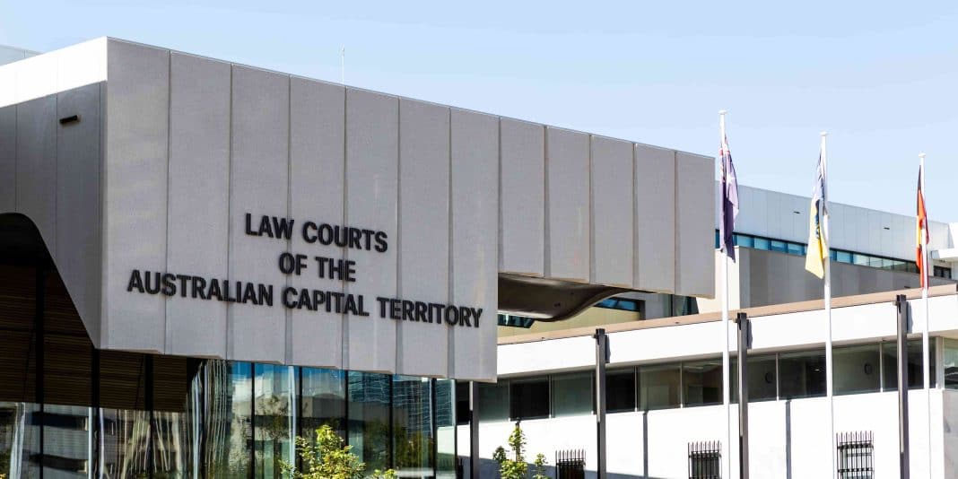concrete and glass exterior of contemporary ACT Law Courts building in Canberra