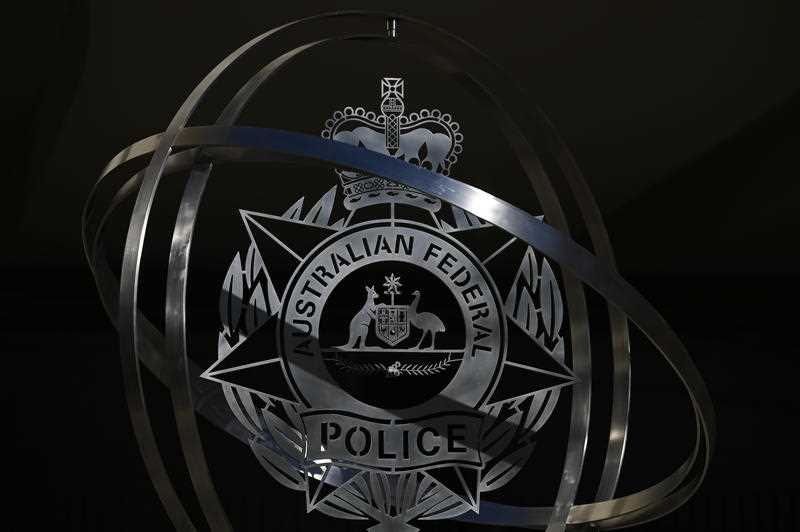 The Australian Federal Police (AFP) emblem is seen outside the Australian Federal Polica (AFP) Headquarters in Canberra