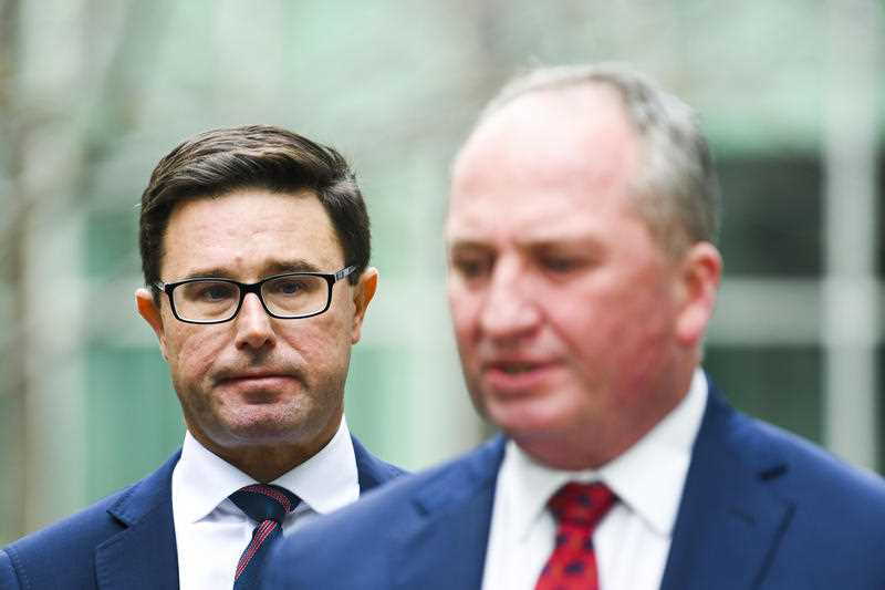 Deputy Leader of the Nationals David Littleproud (left) listens to Nationals Leader Barnaby Joyce during a press conference at Parliament House in Canberra