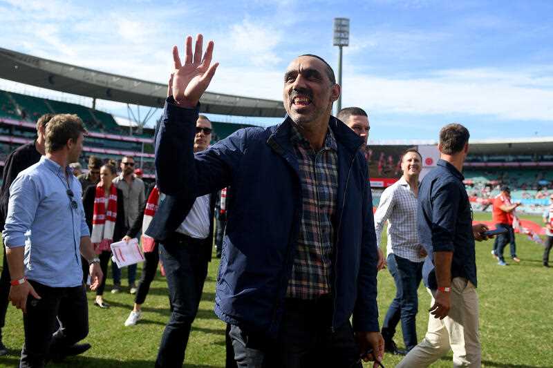 Adam Goodes and members of the Sydney Swans 2012 Premiership winning team take a lap of honour ahead of the AFL Round 8 match between the Sydney Swans and the Gold Coast Suns at the Sydney Cricket Ground in Sydney, Saturday, May 7, 2022