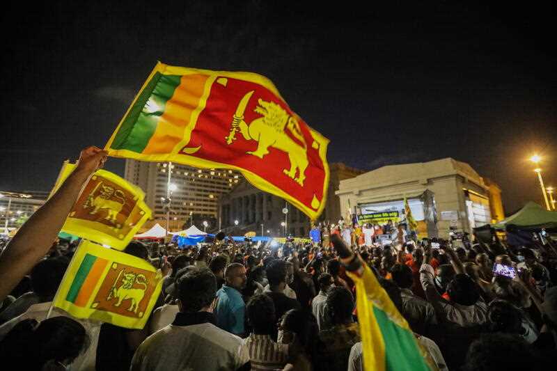 Protesters shout slogans and wave Sri Lankan flags during the occupy protest in front of the Presidential Secretariat in Colombo, Sri Lanka, 07 May 2022.