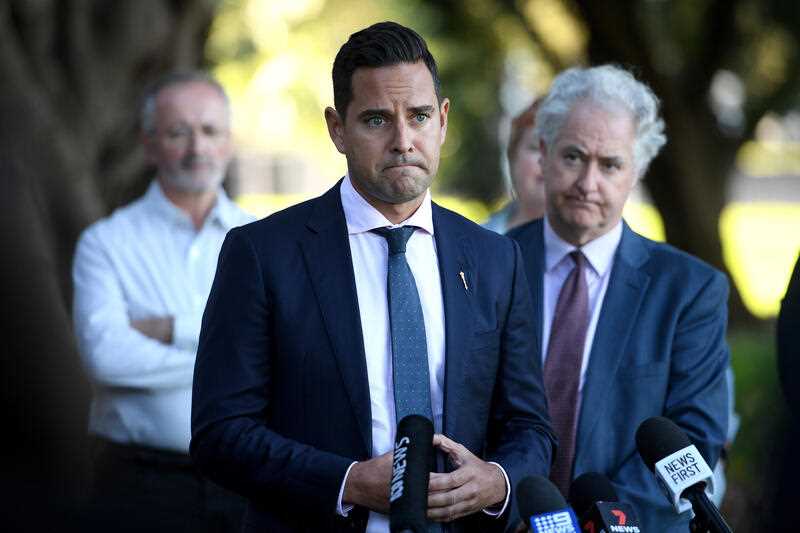 Member for Sydney Alex Greenwich and NSW Labor MLC Adam Searle (right) speaks to media along with MP’s and supporters of the Voluntary Assisted Dying Bill, outside NSW State Parliament in Sydney, Tuesday, May 17, 2022